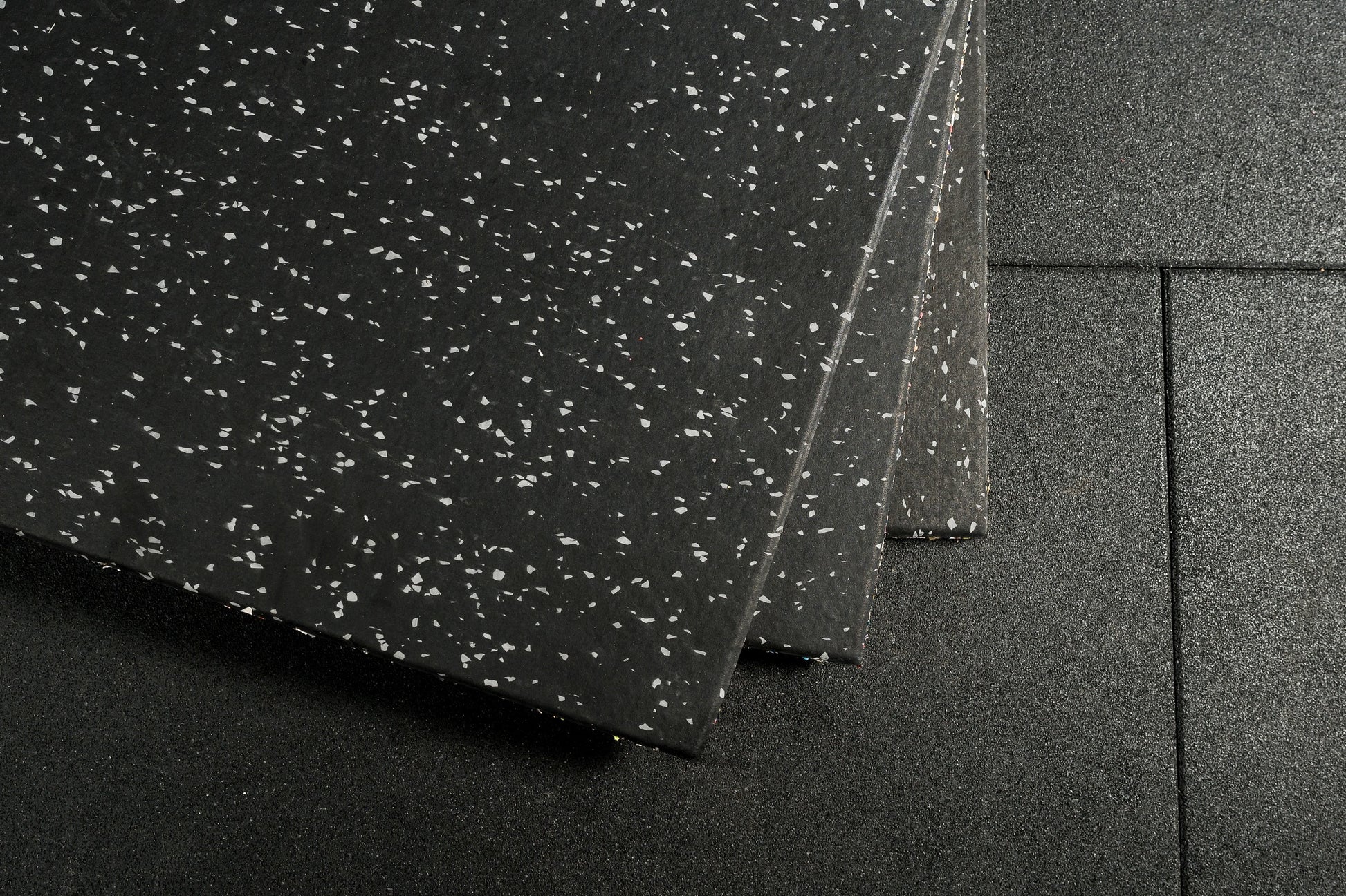 Grey Fleck Flooring on a black mat