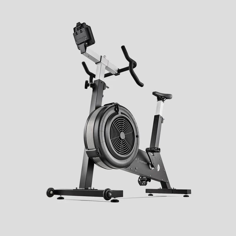 Half human HIIT Exercise bike on a light grey background
