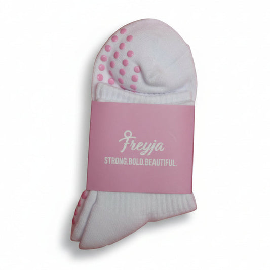 White grip socks with Freyja branding on
