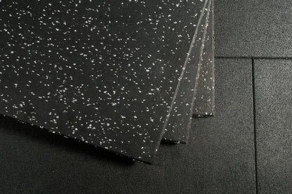 Grey Fleck Flooring on a black mat 