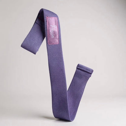 Purple freyja resistance band with a pink label on a light gray background