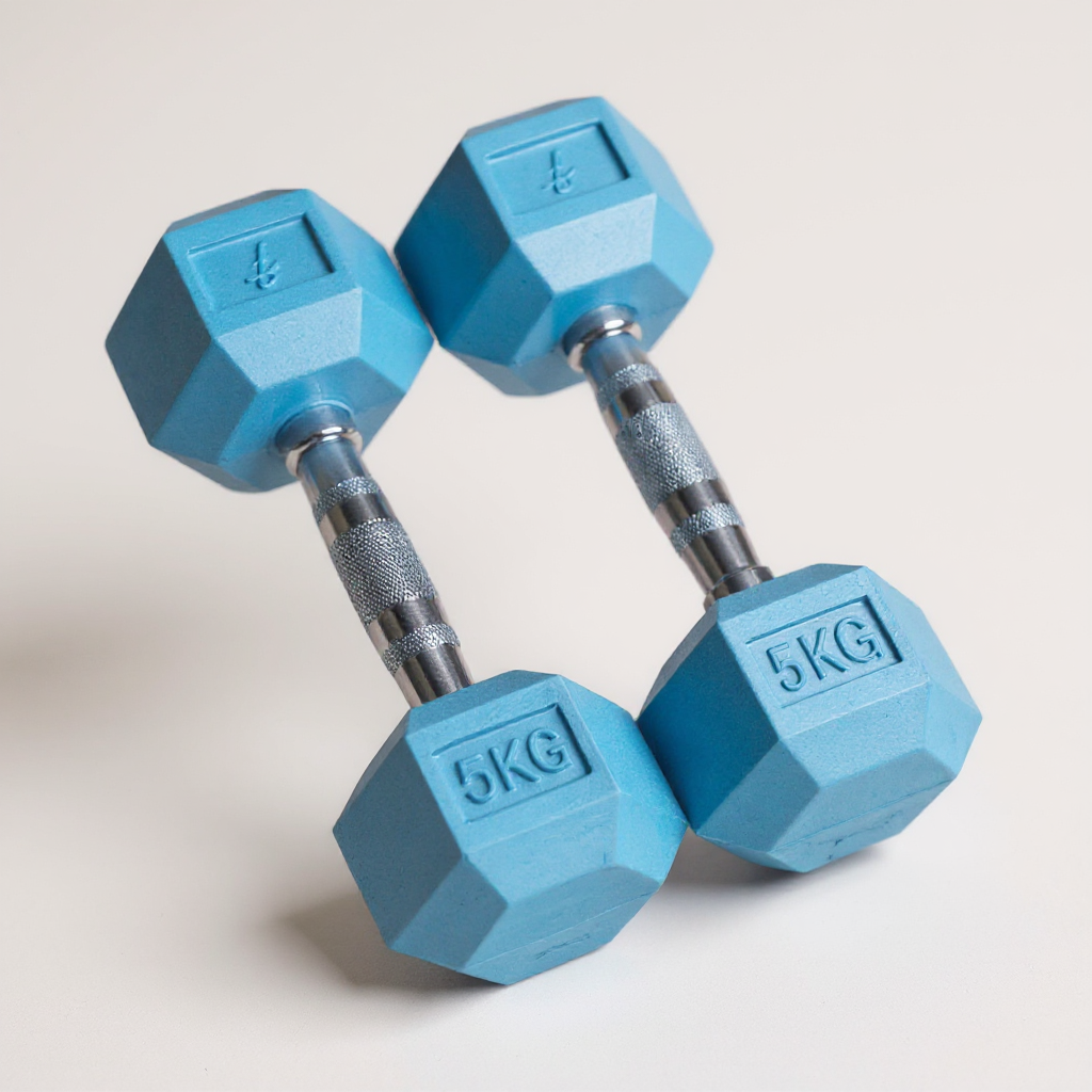Pair of blue freyja hex dumbbells with '5KG' marking on a light background