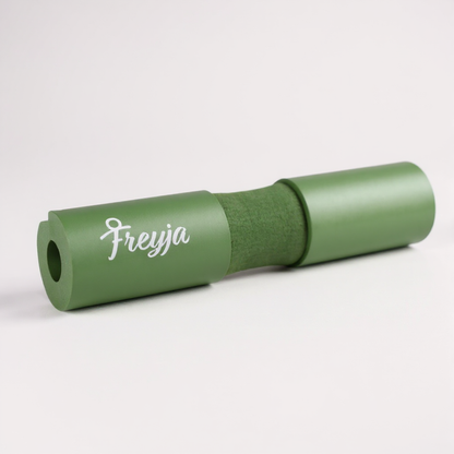 Green freyja barbell pad on a white background 