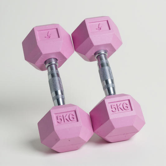Pair of pastel pink freyja hex dumbbells with '5KG' marking on a light grey background