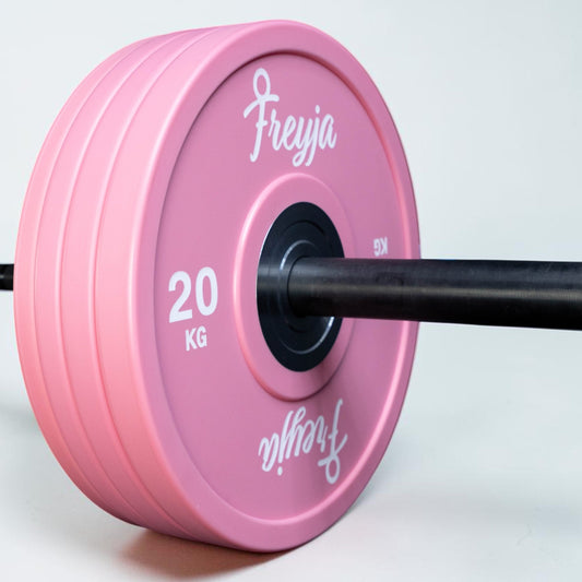 Pink 20kg weight plate with 'Freyja' branding 