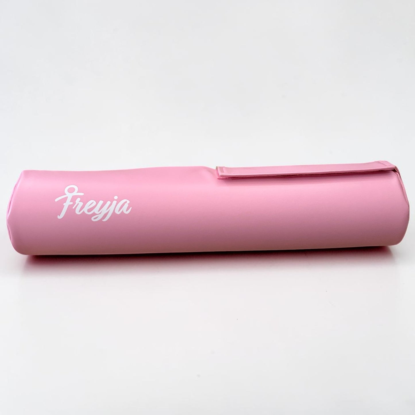 pink barbell pad with freyja branding on 