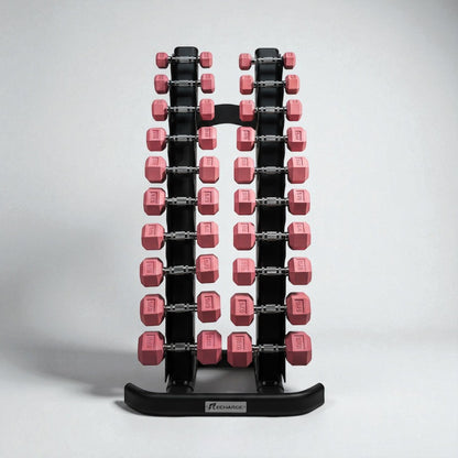 Set of pink hex dumbbells from 1 to 10kg neatly organized on a black vertical dumbbell rack for home or gym use